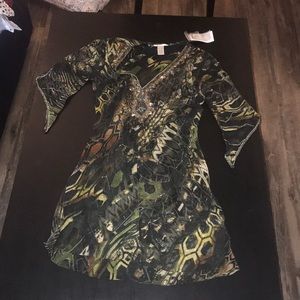 Sheer green, brown, and black beaded top.